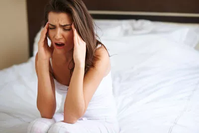 woman exhausted from having sleep apnea