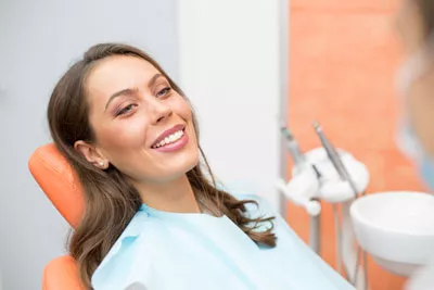patient smiling after getting a smile makeover at Chatsworth Dental Group